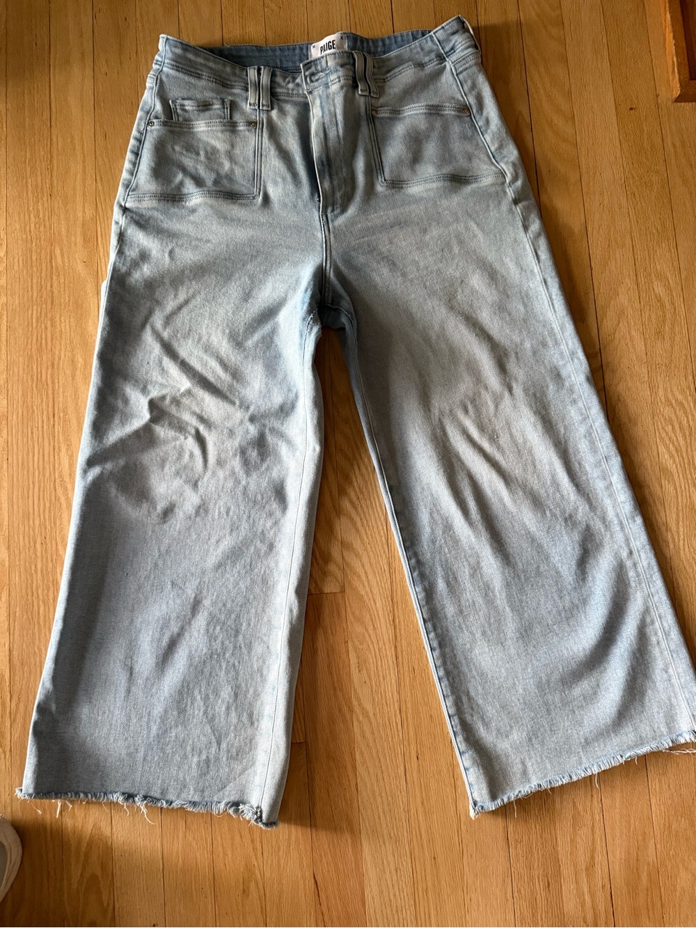 PAIGE Light Blue Wide-Leg Jeans with Raw Hem - Anessa